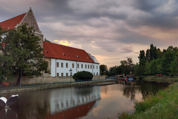 view of bridges and buildings in Ceske Budejovice from boat on the Vltava