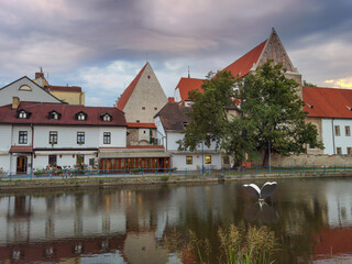 view of bridges and buildings in Ceske Budejovice from boat on the Vltava
