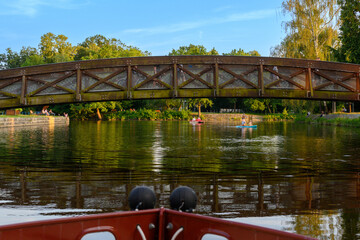 view of bridges and buildings in Ceske Budejovice from boat on the Vltava