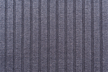 Texture of dense  fabric for tailoring. Canvas. Textile. BlueTextile