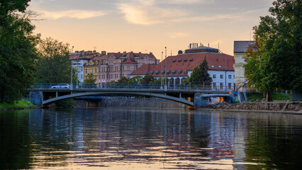view of bridges and buildings in Ceske Budejovice from boat on the Vltava