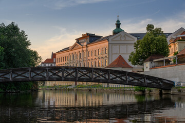 view of bridges and buildings in Ceske Budejovice from boat on the Vltava