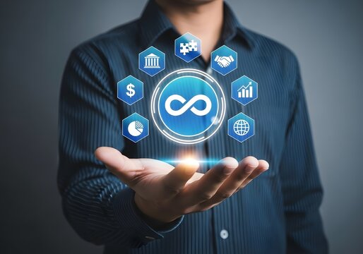Man presenting an infinity symbol surrounded by business icons in the palm of his hand digitally