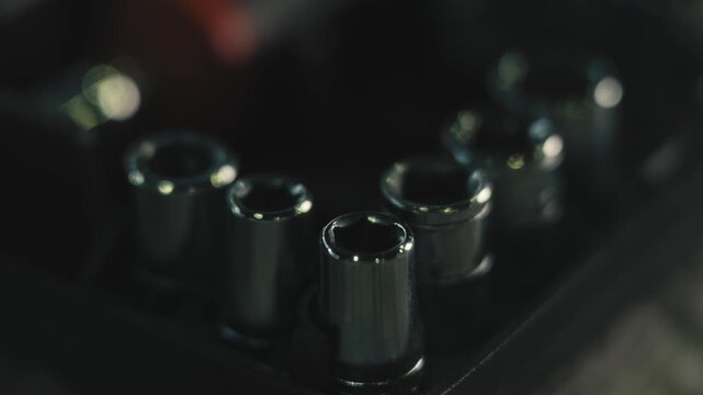 Macro Shot of Chrome Socket Set with Light Reflections