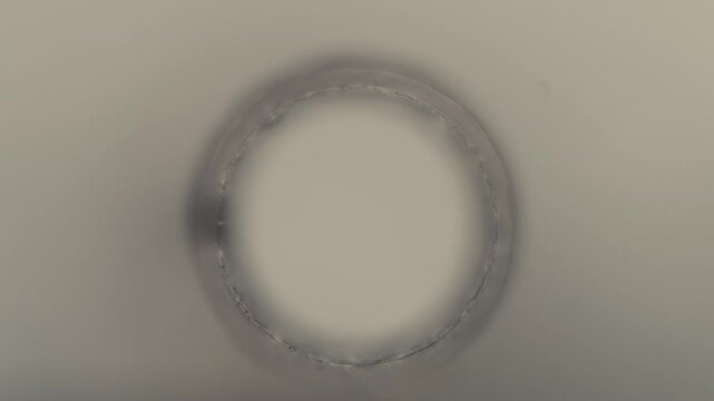 Perfect Circle Mark on Matte Surface with Subtle Light Play
