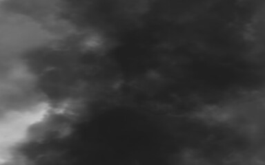 Fototapeta premium Dark and moody storm clouds in a dramatic black and white sky isolated on transparent background