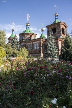 Russian Orthodox Church Cathedral of the Holy Trinity, wooden church with green spires, Karakol, Kyrgyzstan