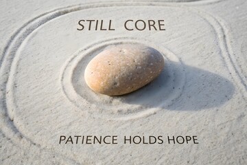 Single Stone Centered on Pale Sand Surface in a Zen Circle
