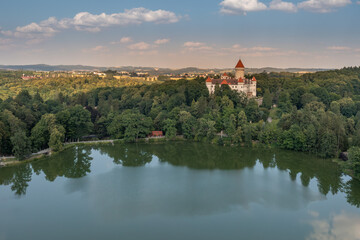 view of Konopiste Castle with reflection on the lake surface