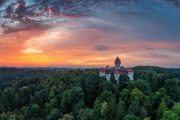 view of Konopiste Castle at sunrise in the fog