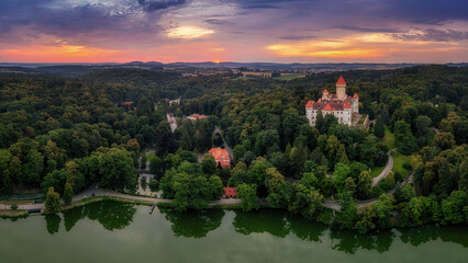 view of Konopiste Castle at sunrise in the fog
