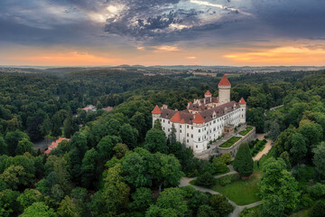 view of Konopiste Castle at sunrise in the fog