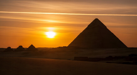 Egyptian pyramids at sunset a desert landscape silhouette of ancient structures against sky at dusk