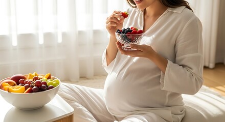 Healthy Pregnant Woman Eating Fresh Berries for Good Nutrition