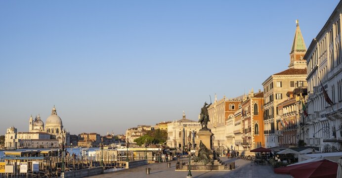 Riva degli Schiavoni promenade with monument to Victor Emmanuel II, Venice, Veneto, Italy