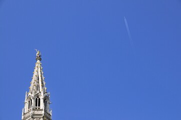 Gilded statue of the Archangel Michael fighting the dragon, the patron saint of the city of Brussels, on the 96 metre high late Gothic Belfry, City Hall, Grand Place, Brussels, Belgium, Benelux