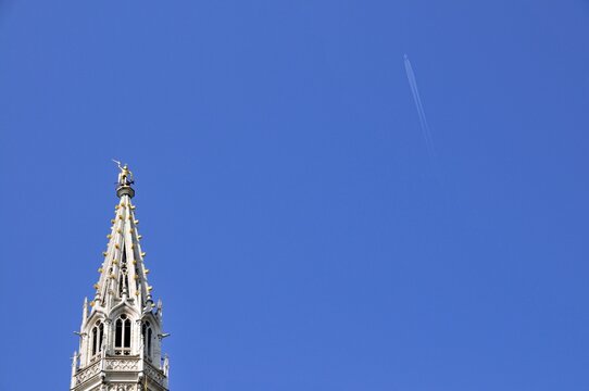 Gilded statue of the Archangel Michael fighting the dragon, the patron saint of the city of Brussels, on the 96 metre high late Gothic Belfry, City Hall, Grand Place, Brussels, Belgium, Benelux