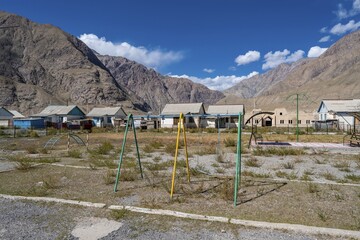 Swings on a playground, ghost town, Engilchek, Tian Shan, Kyrgyzstan