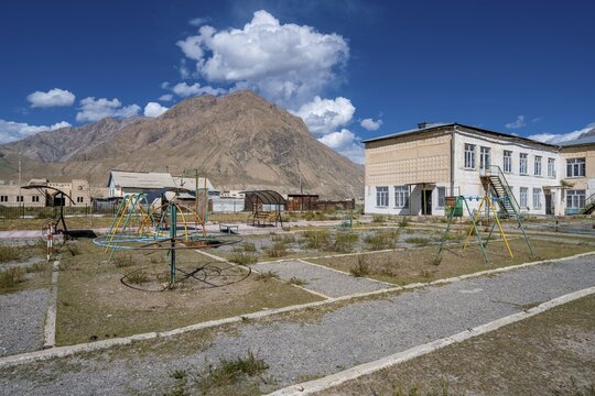 Playground equipment in a playground, ghost town, Engilchek, Tian Shan, Kyrgyzstan