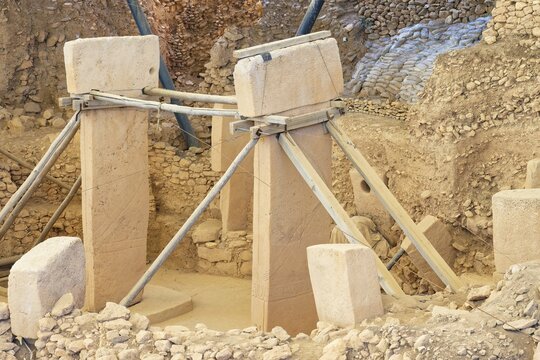 Gobekli Tepe neolithic archaeological site dating from 10 millennium BC, Large circular structures with massive stone pillars, Potbelly Hill, Sanliurfa, Turkey