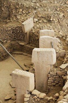 Gobekli Tepe neolithic archaeological site dating from 10 millennium BC, Large circular structures with massive stone pillars, Potbelly Hill, Sanliurfa, Turkey