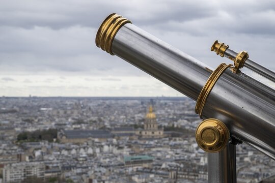 Telescope, Eiffel Tower, in the background Invalides Cathedral, Paris, &Icirc;le-de-France, France