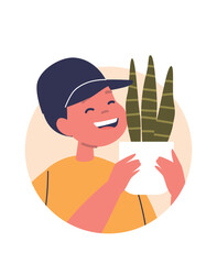 Cute boy kid presenting houseplant