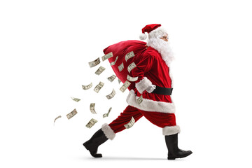 Santa claus running with a sack full of money on his back