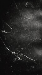 A dramatic close-up reveals striking white line patterns against a dark, textured surface background.