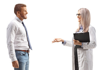 Female doctor standing and talking to a man