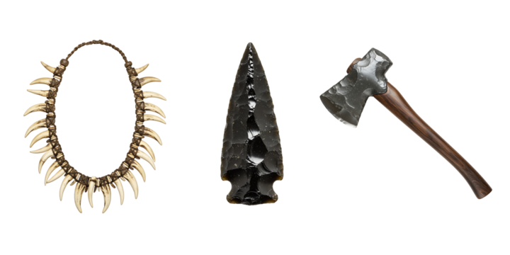 Collection of ancient artifacts including a tooth necklace obsidian arrowhead and axe