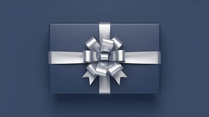 A rectangular dark blue gift box adorned with a shimmering silver ribbon and a voluminous bow presented from above