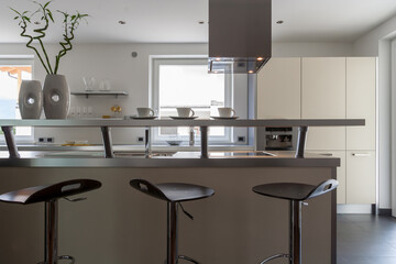 Modern Kitchen Interior with Island and Bar Stools