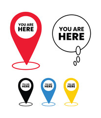A collection of colorful location pins and a speech bubble graphic, all displaying the text 'YOU ARE HERE', representing navigation and presence.