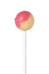 Pink and yellow round lollipop candy on stick
