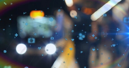 Showing blue med-social icons over city street night with lights and right two in warm or dark coats