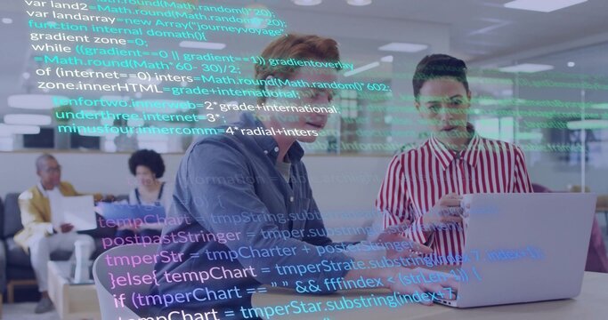 Discussing two males in navy and red shirts reviewing laptop code in office, with code overlay