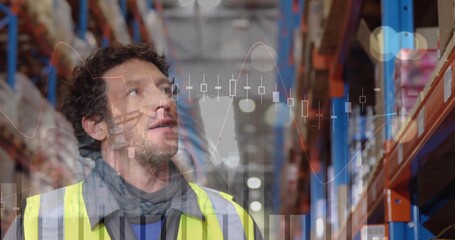 Scanning warehouse worker in hi-vis vest and scarf checking tall racks in aisle, showing chart