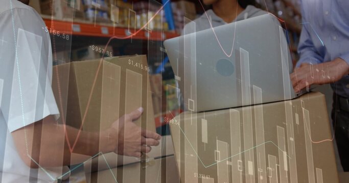 Sorting warehouse team moving boxes with silver laptop in packing area, racks charts casual clothes