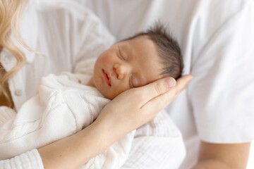 Serene Newborn Baby Sleeping Comfortably in Mother s Arms A Tender Moment of Love and Care.