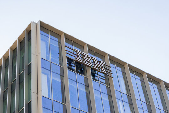 Ibm logo on modern corporate office building facade