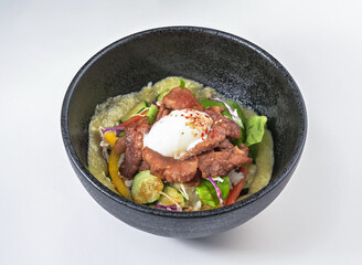 A vibrant beef bowl with fresh veggies and poached egg offers a healthy, flavorful meal. Perfect for healthy recipes, food blogs, and culinary promotions.