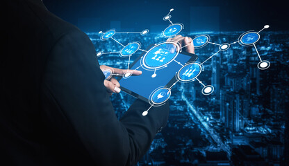 A business professional interacts with a futuristic digital interface on a tablet, showcasing virtual data visuals against a vibrant city skyline in the background. Tessel