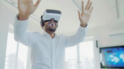 Man Wearing Virtual Reality Headset Smiling Joyfully in Bright Modern Office