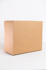 Mock-up of cardboard box, product and paracel packaging isolated on White background. Vertical orientation.