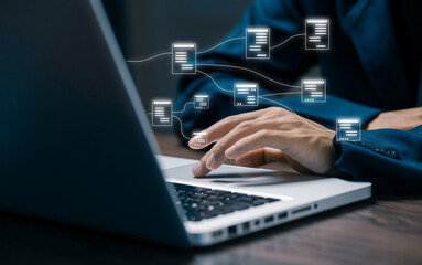 Hand typing on laptop with floating data flow nodes, representing database system, information network, cloud computing, digital connectivity, and structured data management.