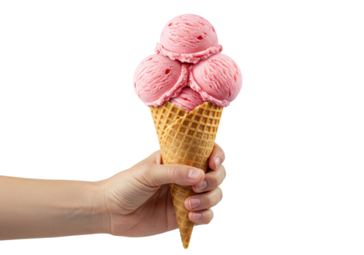 A clean caucasian hand holds a golden-brown waffle cone with three swirled scoops of rosy pink strawberry ice cream, flecked with fresh strawberries, on a transparent background with copy space,