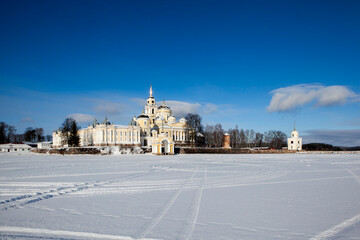 The Nilov-Stolobenskaya Hermitage on Lake Seliger, on Stolobny Island, on a sunny winter day. Tver Oblast, Russia