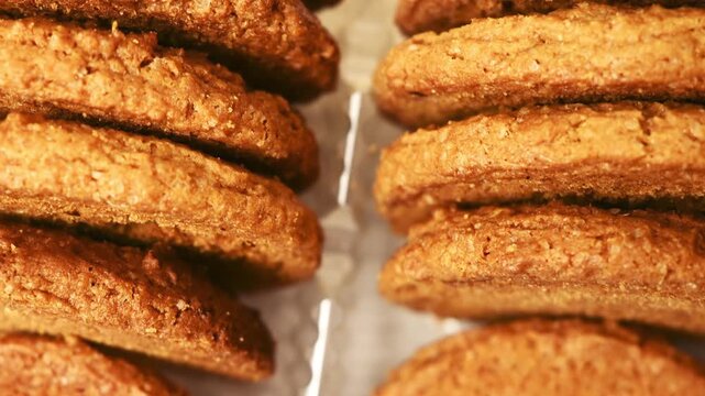 Oatmeal cookies in package background. Tasty pastry