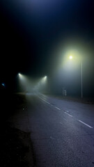 Misty nocturnal road whispers eerie tales, urban solitude, lost stories of Samhain wanderers,...